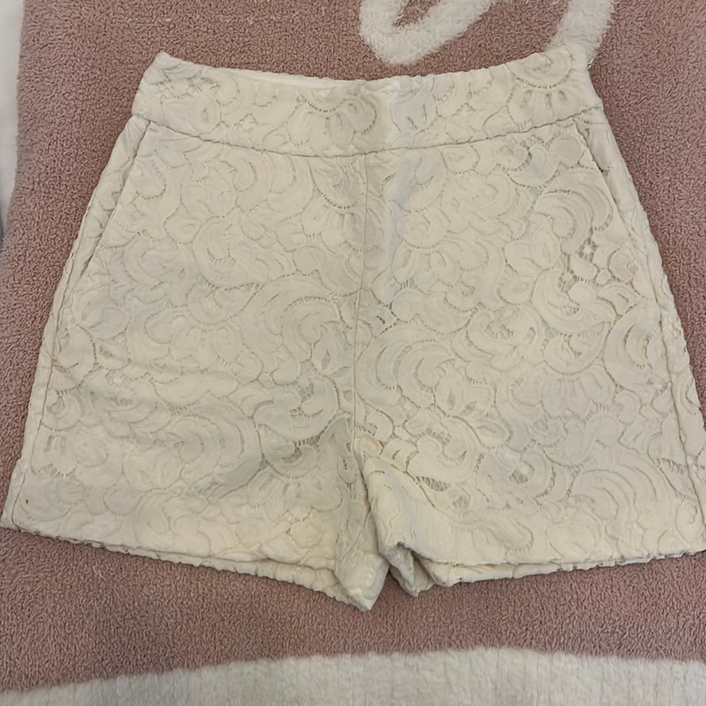 White patterned shorts size 0 express brand. Lace overlay.